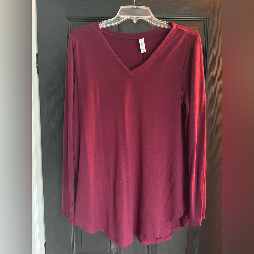 Tunic length long sleeve shirt